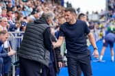Blackburn boss Tony Mowbray with John Mousinho. Pic: Jason Brown