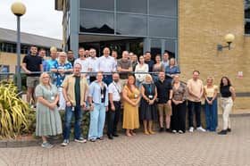 ARM team outside the headquarters