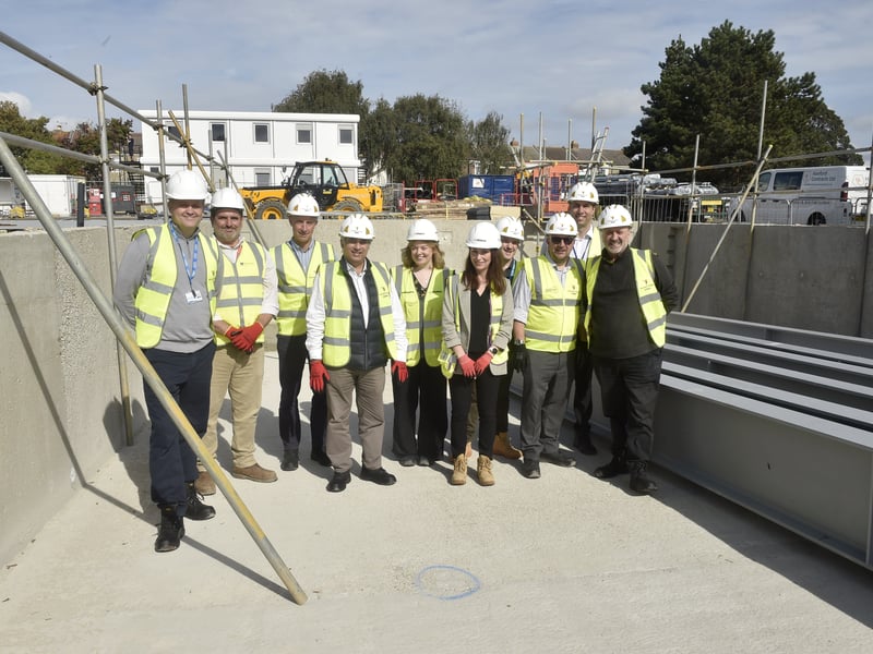 Milestone reached after concrete has been poured in to the main pool at Bransbury Park Leisure Centre on Thursday, September 24, 2026. Pictured is: (l-r) James Roach (NHS Hampshire and Isle of  Wight ICB), David Moorman (Portsmouth City Council), Jon Workman (BH Live), Dr Raj Bhateja (Lighthouse Group Practice), Nadia Houston (Mace), Katya Fenton (Mace), Cllr Matthew Winnington, Cllr Steve Pitt, Rob Cunningham (BH Live) and Cllr Lee Hunt.Picture: Sarah Standing (240926-8060)