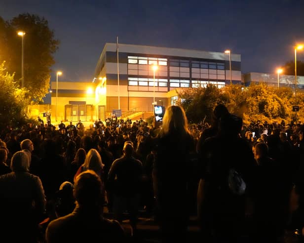 Protesters gathered outside the Hampshire Constabulary Police Investigation Centre in Basingstoke following the arrest of far-right activist Daniel Thomas, also known as Danny Tommo, after he was filmed slashing the side of a dinghy in the English Channel with a rescue crew member still on board. Picture: PA Wire