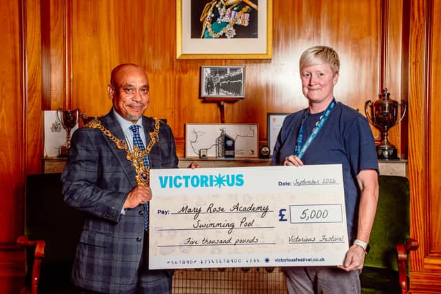 Mary Rose Academy receive a cheque from Victorious, presented by Portsmouth Lord Mayor Councillor Abdul Kadir