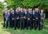Group photo of all members of Portsmouth Diving Threat Exploitation Group Bravo Squadron.