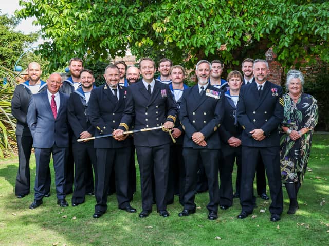 Group photo of all members of Portsmouth Diving Threat Exploitation Group Bravo Squadron.