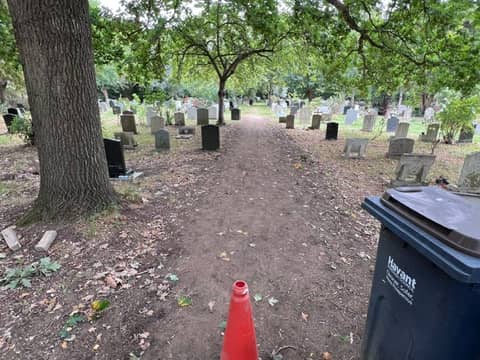 A paved footpath has been dug up in Warblington Cemetery to make room for more graves