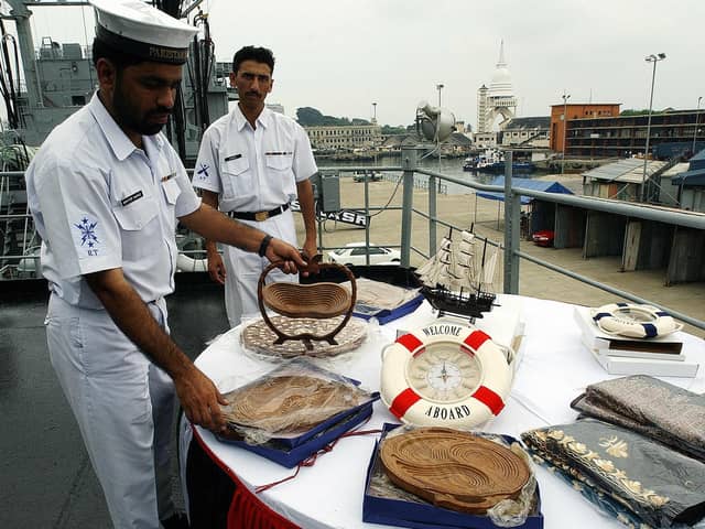 The deadline to save HMS Ambuscade, now known as PNS Tariq, from being blown up has not be extended. Pictured: Pakistan sailors aboard PNS Tariq arrange souvenirs on board the vessel at the Colombo port, 15 November 2004, during an official port call on Sri Lanka.