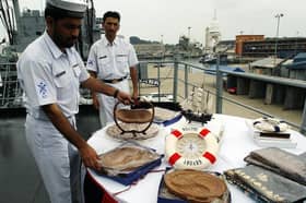 The deadline to save HMS Ambuscade, now known as PNS Tariq, from being blown up has not be extended. Pictured: Pakistan sailors aboard PNS Tariq arrange souvenirs on board the vessel at the Colombo port, 15 November 2004, during an official port call on Sri Lanka.