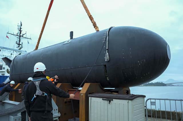 A large robot submarine XV Excalibur, used by the Royal Navy, has fired a torpedo for the first time in a landmark trial.