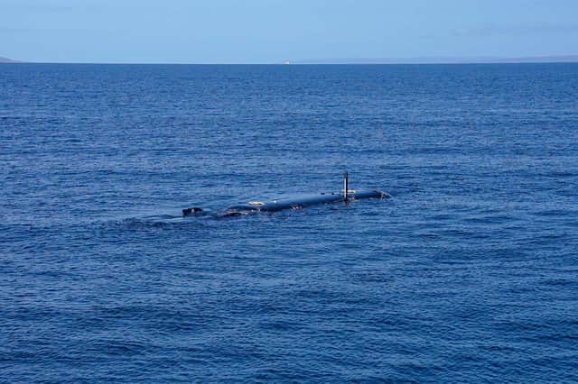 Royal Navy drone submarine XV Excalibur in the water.