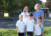 Toni Harris and Tamsin De La Haye with Arthur 7, Teddy 6 and George 6 outside Moorings Way Infant School, Southsea