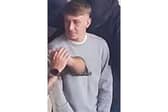 Police are asking for help in identifying this man after a flare was thrown at supporters from the away end at Fratton Park.