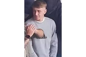 Police are asking for help in identifying this man after a flare was thrown at supporters from the away end at Fratton Park.