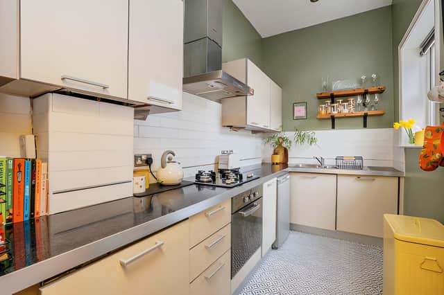 The fitted kitchen comes equipped with an oven, hob, extractor, fridge and washing machine for everyday convenience