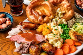 A Toby Carvery feast piled high with roast meats, Yorkshire puddings and all the trimmings.