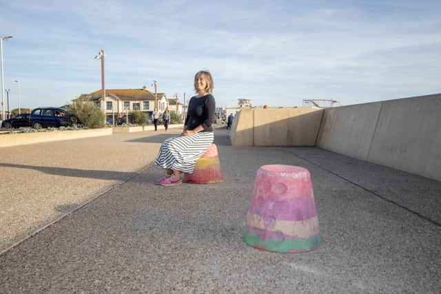 Artist Flora Duley on her artwork near Clarence Pier, Southsea

Picture: Habibur Rahman