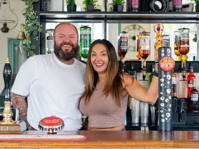 Tommy Hoare and Trina Wheeler behind the bar at The Old Oyster House Picture:  Alec Chapman