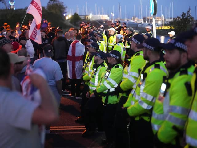 Police block Haslar Road in Gosport and bring in dispersal order ahead of a migrant boat arrival - October 4, 2026