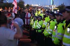 Police block Haslar Road in Gosport and bring in dispersal order ahead of a migrant boat arrival - October 4, 2026