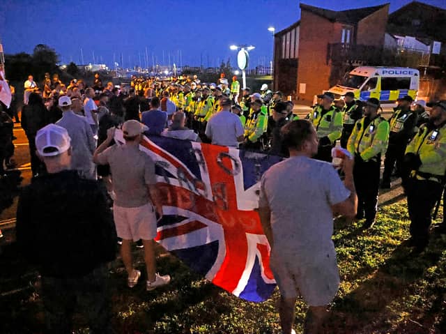 Police and demonstrators during a protest in Gosport. 