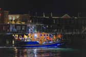 A group of people thought to be migrants are brought in to a marina in Gosport, by the RNLI following a small boat incident in the Channel. Picture date: Sunday October 4, 2026. PA Photo. Photo credit should read: Trevor Adams/PA Wire