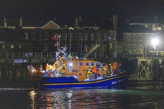 Migrants were brought in to a marina in Gosport, by the RNLI following a small boat incident in the Channel