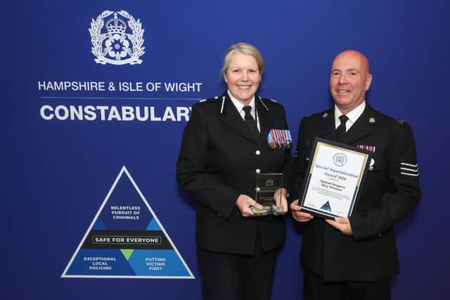 ACC McGovern, left, with Special Sergeant Gary Schuster.