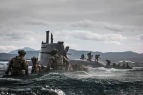 Royal Marines Commandos aboard U-Boat off the North coast of Scotland during Strike Warrior 26.