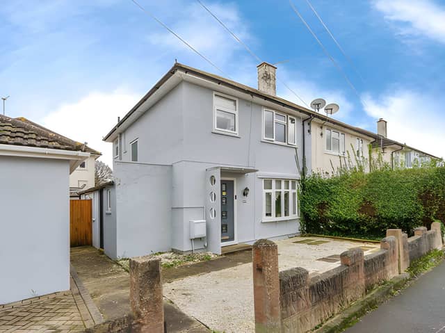 The Beauchamp Avenue semi-detached home comes with ample off-road parking and a detached garage with an electric door