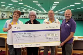 Members of the Palmerston Indoor Bowling Club raised £7,500 by abseiling down the Spinnaker Tower.