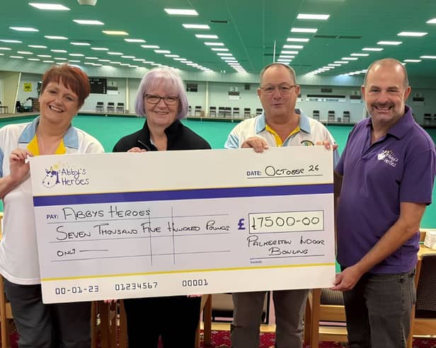 Members of the Palmerston Indoor Bowling Club raised £7,500 by abseiling down the Spinnaker Tower.