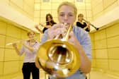 Matt Woods and other music students test out the new music room which will be used for performance at South Downs College.
Picture: Luke MacGregor