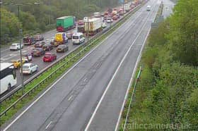 A man has died on the M3 after falling from a motorway bridge.