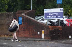 A person leaving HMP Winchester in Hampshire. 