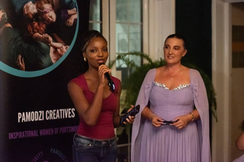 Adey shared her powerful poetry at the official launch of nominations for Pamodzi Creatives' Inpirational Women 2027. Host Debbie Smith watches on
