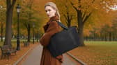 The Kono expandable cabin bag features a separate cosmetic pouch, wet pocket and trolley strap.