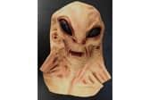 A moulded alien mask which was stopped from going on sale in the UK after being tested by Hampshire trading standards. It was found to present a risk of suffocation. October 2026