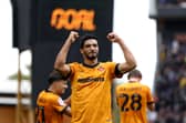 Wolves striker Raul Jimenez will miss Pompey's trip to Molineux next week.