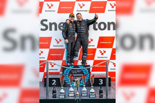 From left, Jamie Falvey and Paul Fullick with their assorted trophies from the 2026 season.