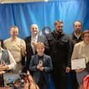 The winners gather on stage at the Intenational Men's Day Appreciation Awards last year.