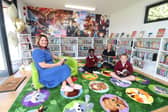 Mayor of Gosport Cllr Kristen Bradley, executive headteacher Georgina Mulhall, plus Ruby and Max, 10, inside the new library.