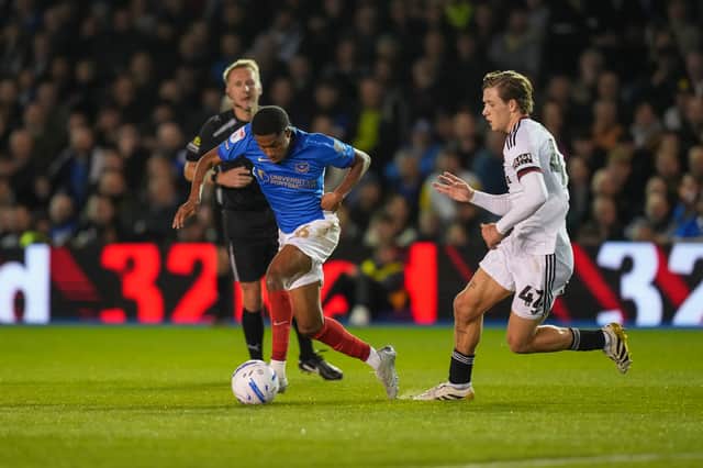 Referee Oliver Langford watches on as Pompey defender Jayden Meghoma bursts forward with the ball during the Blues' 3-2 win against Sheffield United on Wednesday night.