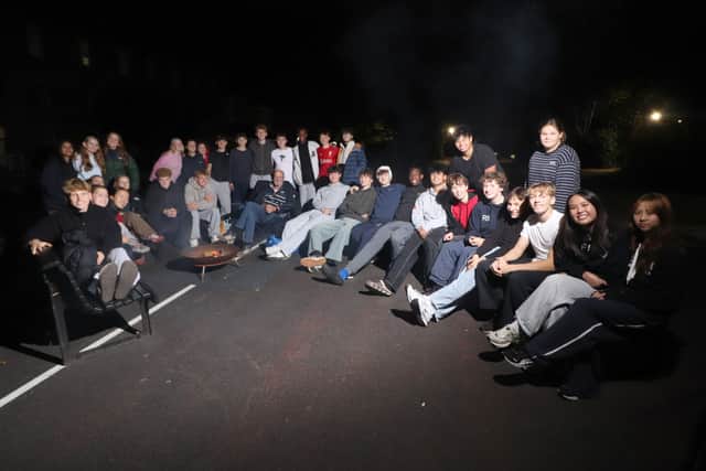 Portsmouth Grammar School students sleeping outside on school grounds.