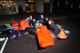 Portsmouth Grammar School students sleeping outside on school grounds.