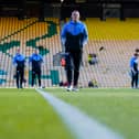 Colby Bishop on the Carrow Road pitch before he sustained an injury in the pre-match warm-up