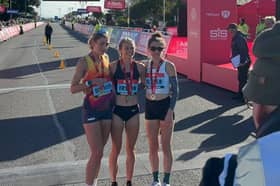 Hannah Irwin, middle, won the elite women's race at the 2026 Great South Run.