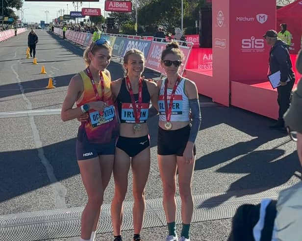 Hannah Irwin, middle, won the elite women's race at the 2026 Great South Run.