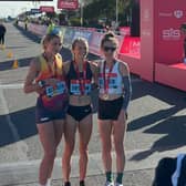 Hannah Irwin, middle, won the elite women's race at the 2026 Great South Run.