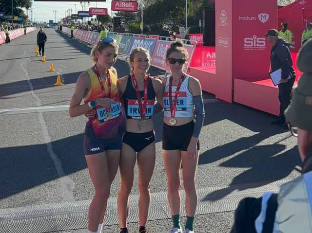 Hannah Irwin, middle, won the elite women's race at the 2026 Great South Run.