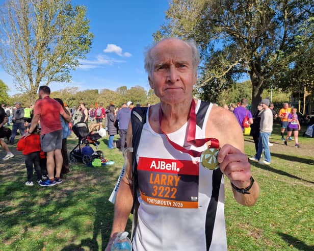 Larry Cattle, 74, with his medal for completing the 2026 Great South Run.