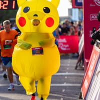 189 cheerful photos of green and orange wave runners at the Great South Run