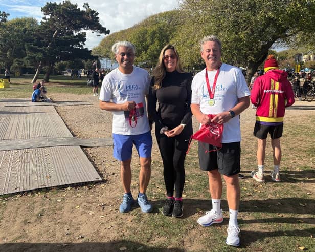 From left, Professor Jim Khan, Elise Sargent and Stuart Maun.